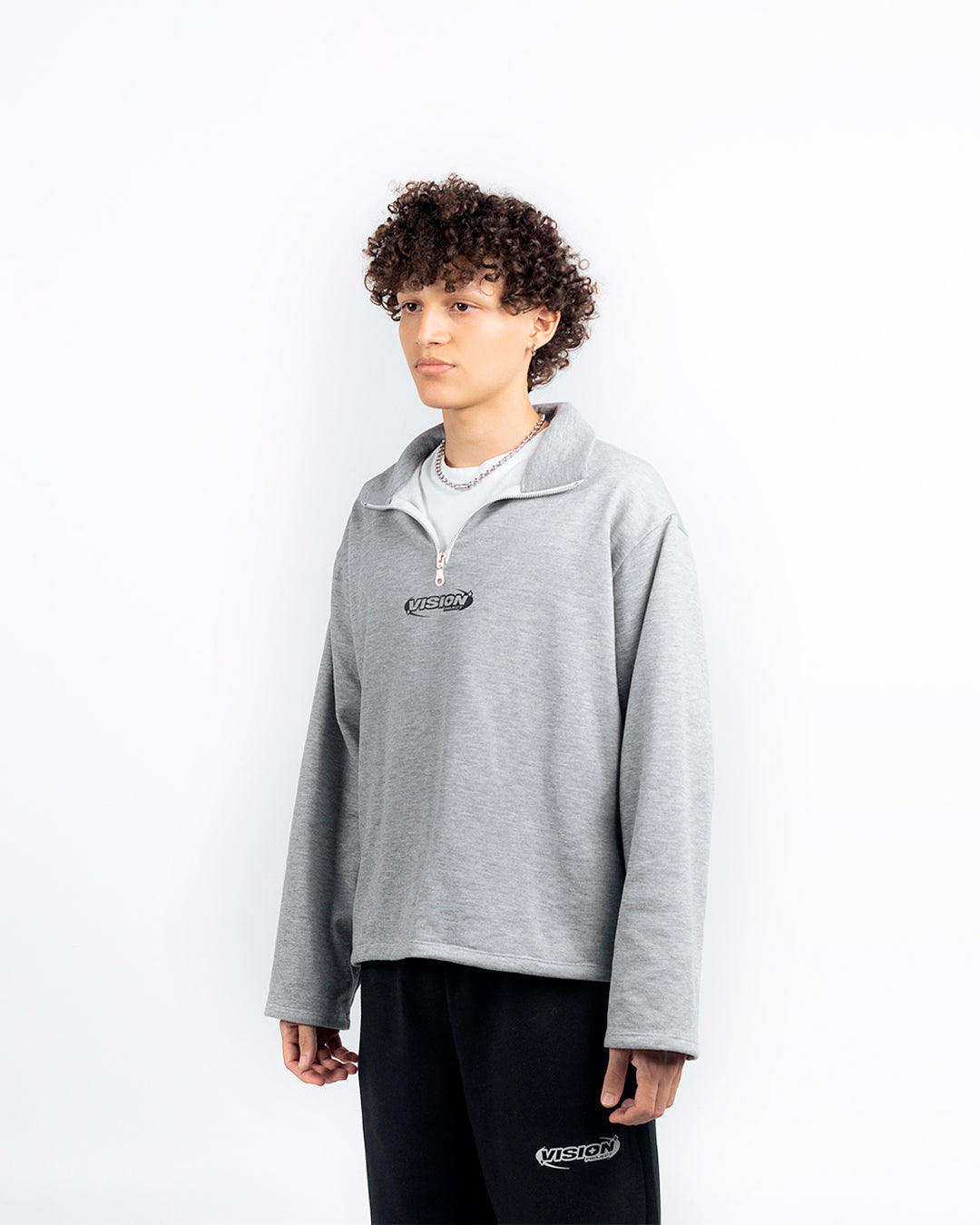 SWEATER GRIS VISION